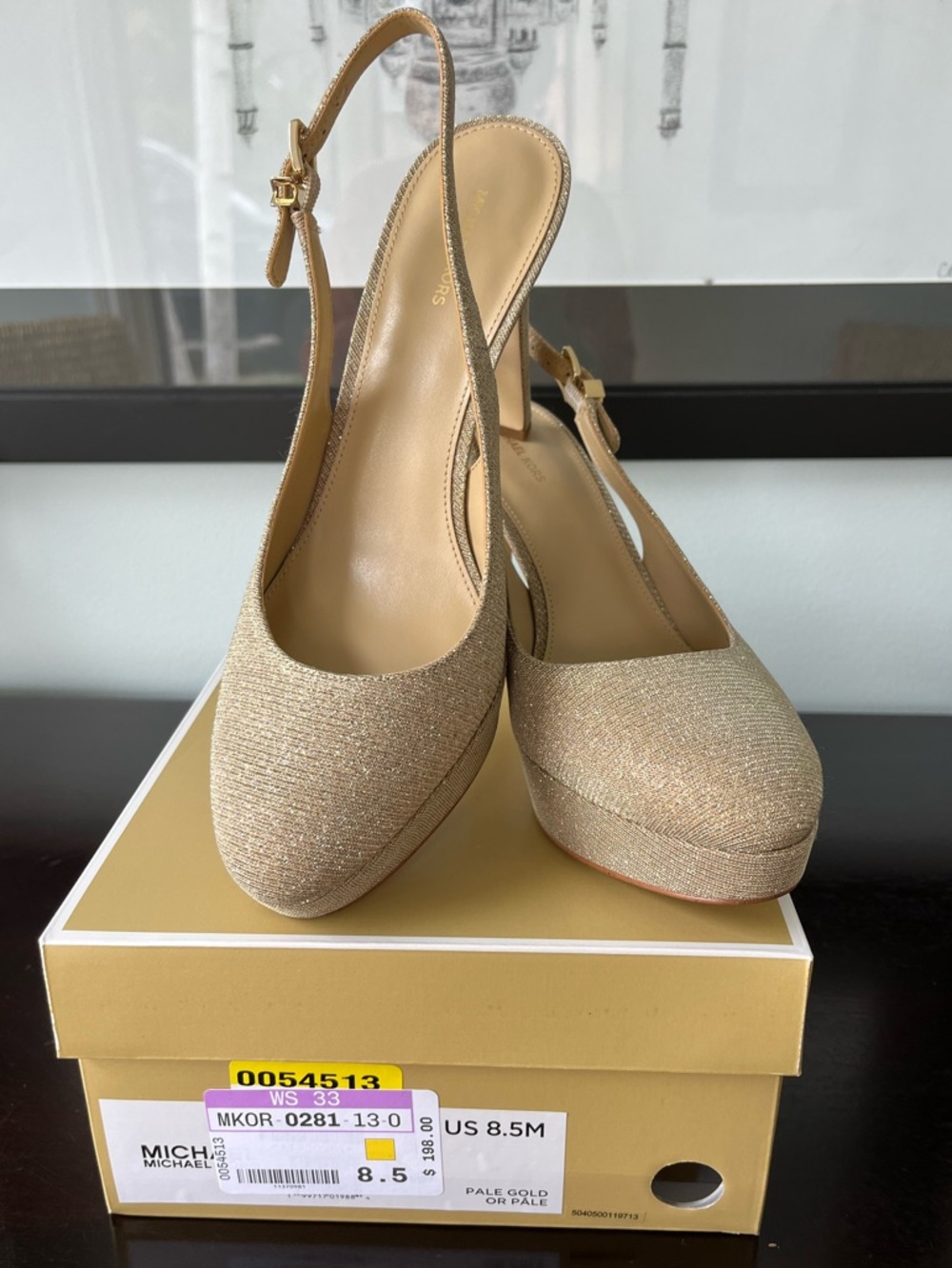 MICHAEL KORS
TRACY PLATFORM SLING PUMP
$198.00 worn only in a photo